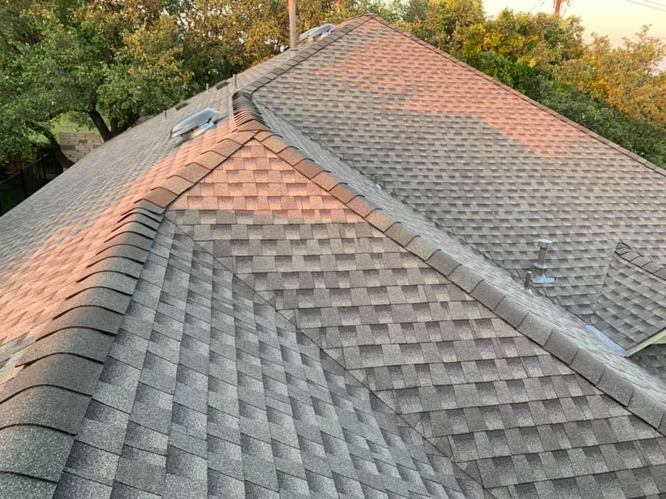 Storm damage restoration example: Completed roof installation with ridge detail by FRS roofing contractor in Central Texas