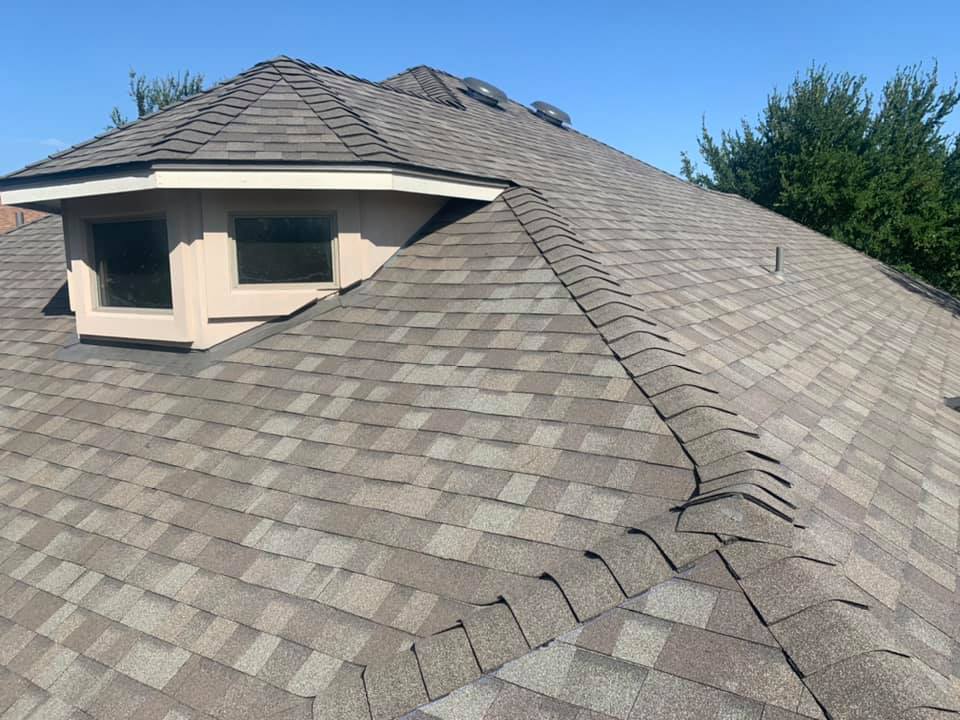 Roof repair example: Completed gray shingle roof replacement by FRS in the Central Texas service area